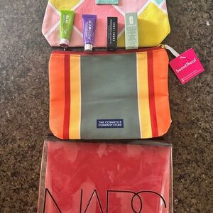 Clarins Multi-Color and two other Cosmetic Bag
Brand new